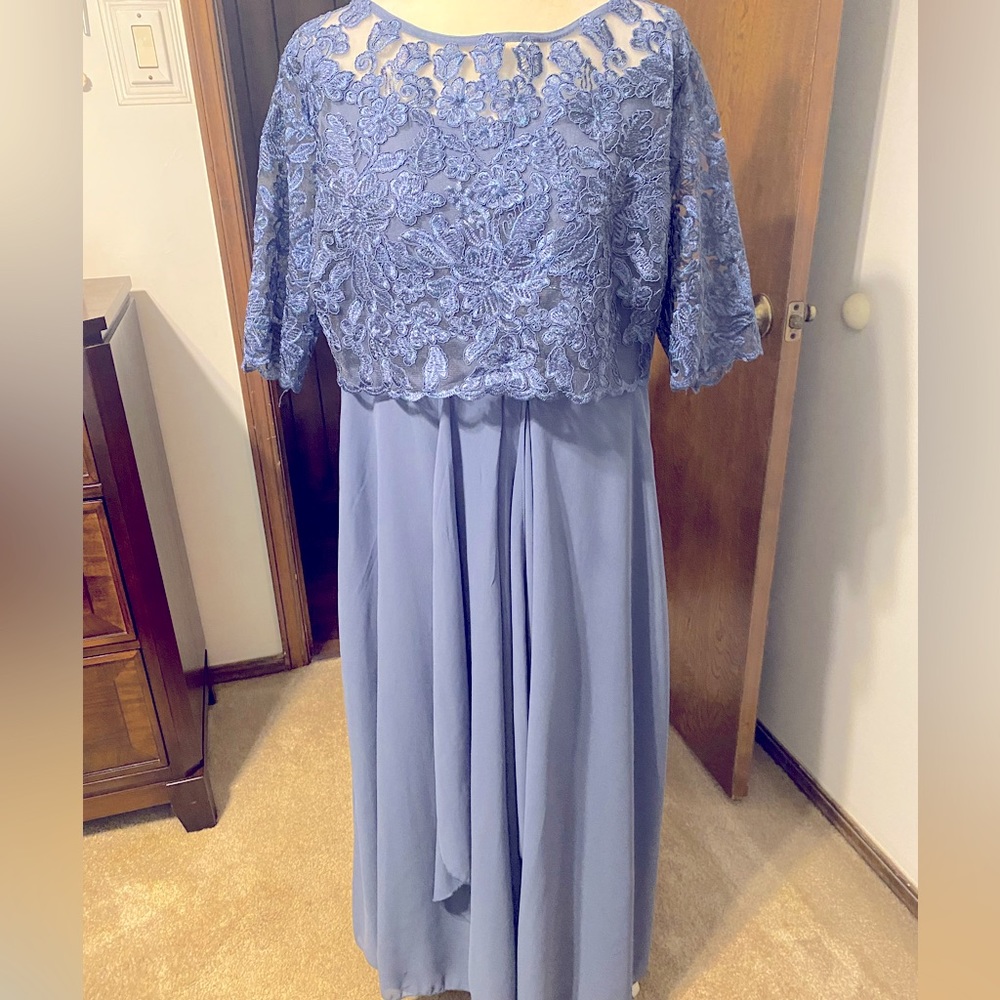 Mother’s dress. Worn once; dusty blue color. Size large